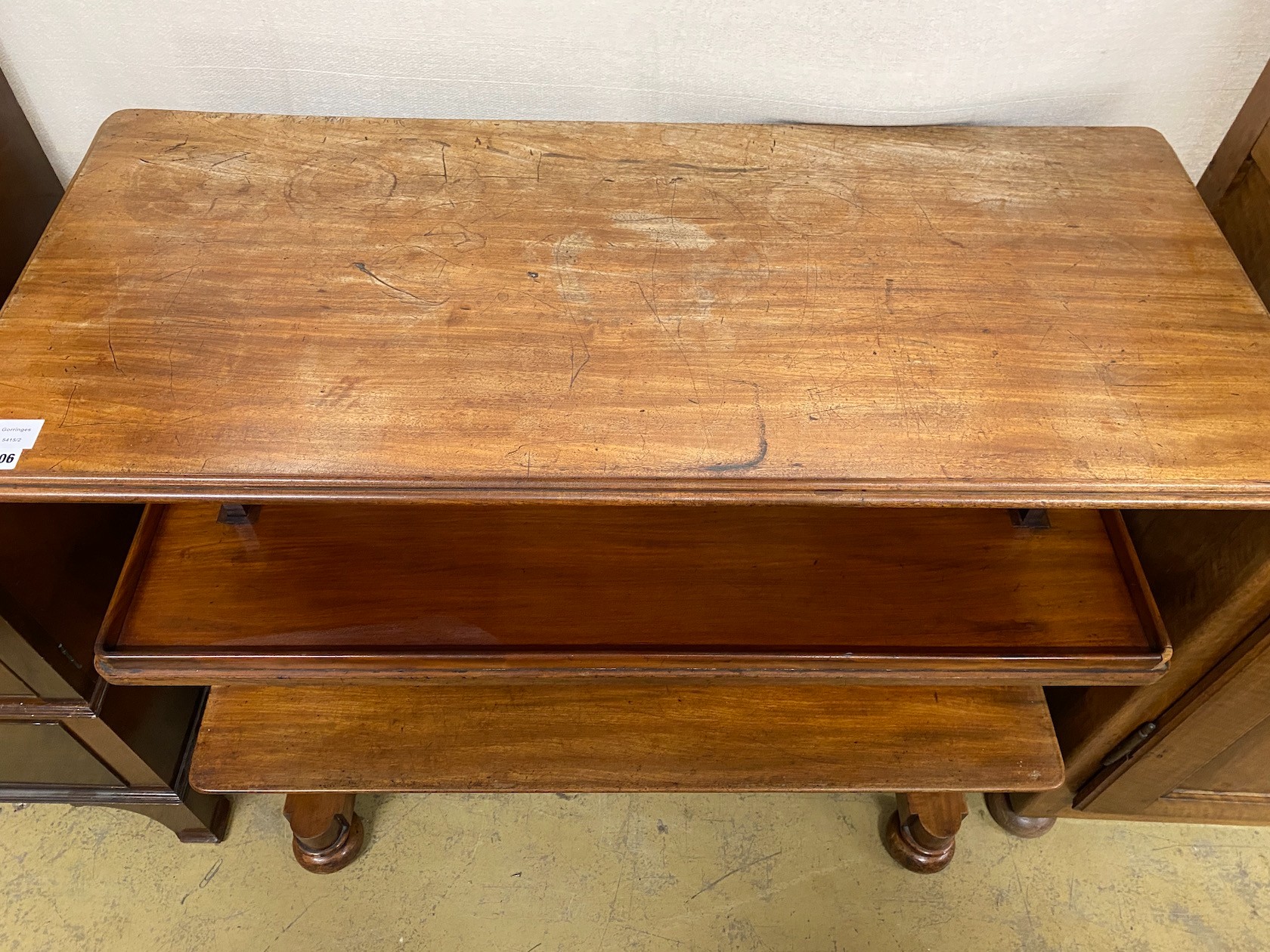 A mid Victorian mahogany metamorphic three tier buffet, width 121cm, depth 54cm height 104cm extended.